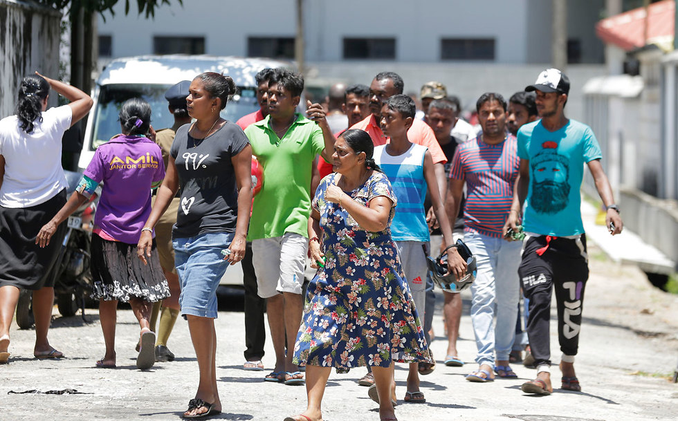 Families of victims of the Sri Lanka bombings gather at a hospital in Colombo (Photo: AP)