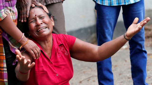 Relative of victims (Photo: Reuters)