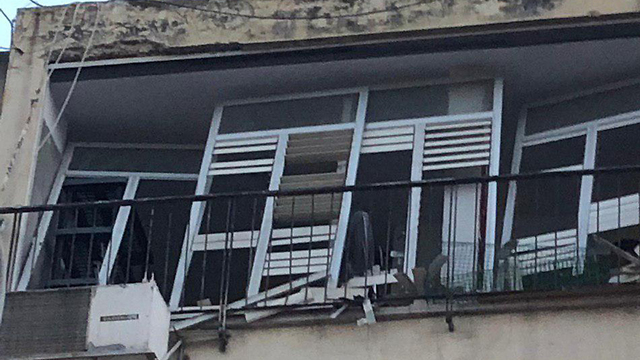 damage caused to apartment building in Ashdod where Pinchas Menachem Prezuazman was killed