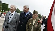  French-born GI Bernard Dargols, 87, left, who landed with the US troops on Omaha Beach on June 8,
