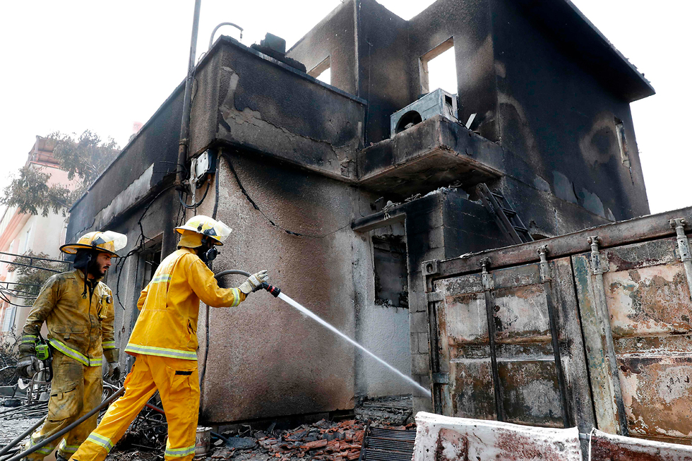שריפה במבוא מודיעים  (צילום: AFP)
