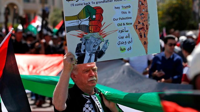  הפגנה של פלסטינים ביום הנכבה ברמאללה (צילום: AFP)