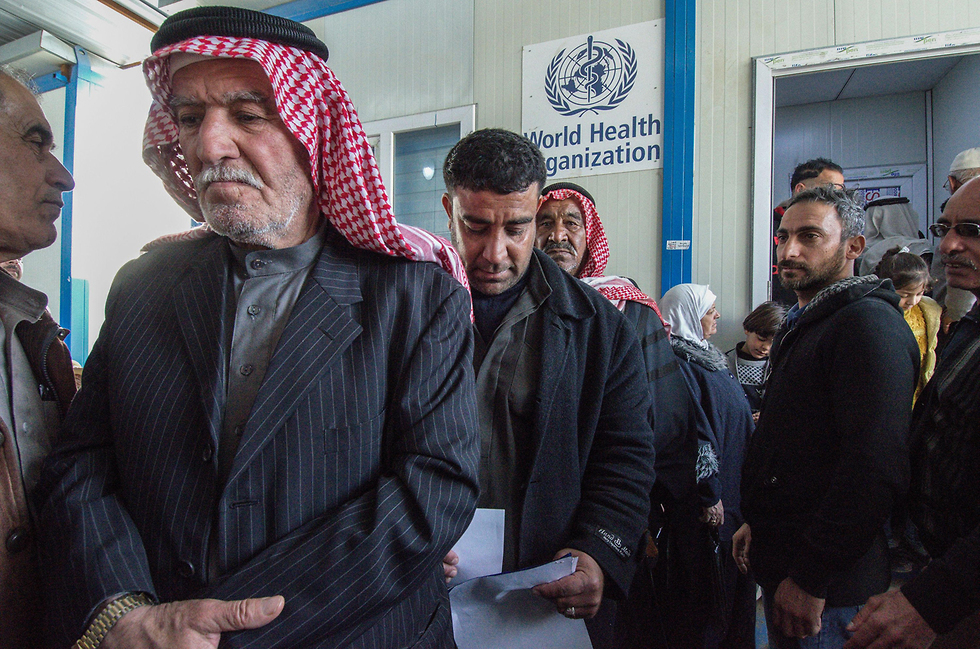 תושבים ב מוסול בית חולים אובדן שמיעה אחרי הניצחון על דאעש עיראק (צילום: AFP)