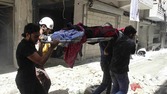 אידליב סוריה הפצצות הפצצה  (צילום: Syrian Civil Defense White Helmets ,AP)