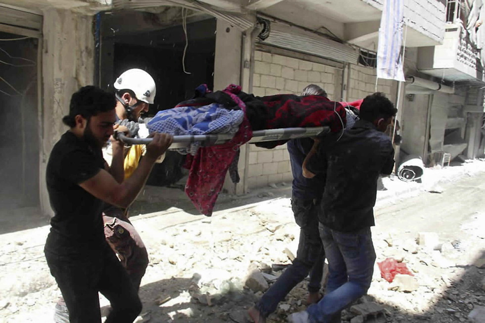 אידליב סוריה הפצצות הפצצה  (צילום: Syrian Civil Defense White Helmets ,AP)