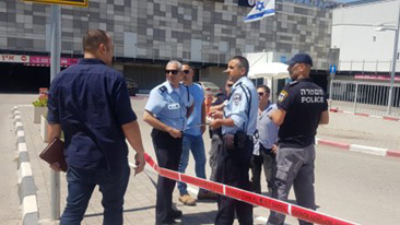 Нападение на охранника торгового центра в Рамат-Ишай. Фото: пресс-служба полиции