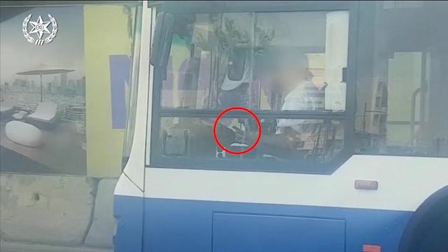A bus driver for the Dan company in central Israel caught texting while driving (Photos: Police Spokesmen )