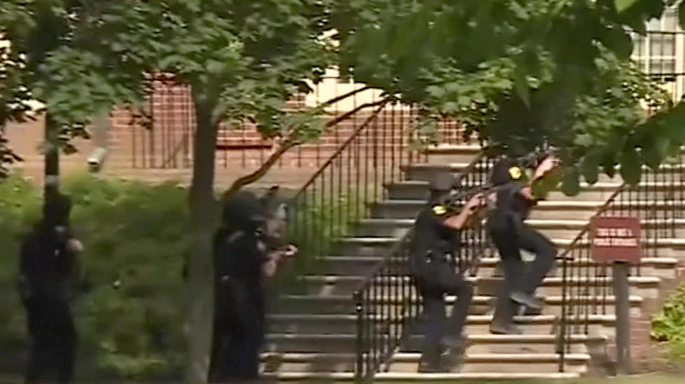 Police enter a building in this still image taken from video following a shooting incident at the municipal center in Virginia Beach, Virginia, U.S. May 31, 2019. (Photo: Reuters)