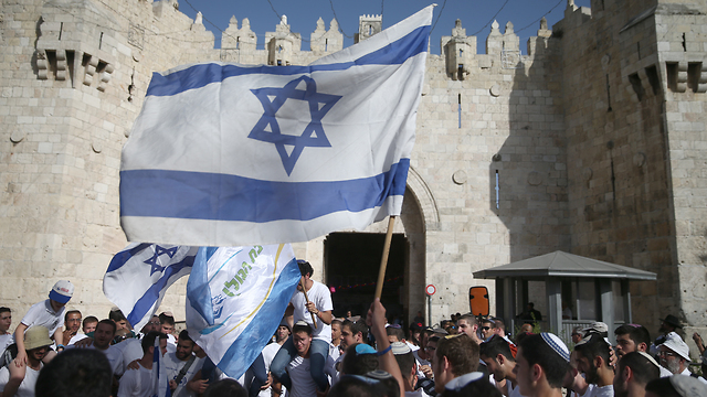 Марш с флагами в Иерусалиме. Фото: Охад Цвайгенберг