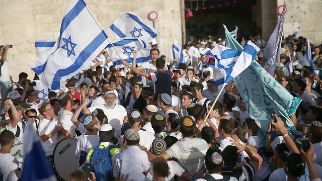 Марш с флагами в Иерусалиме. Фото: Охад Цвайгенберг