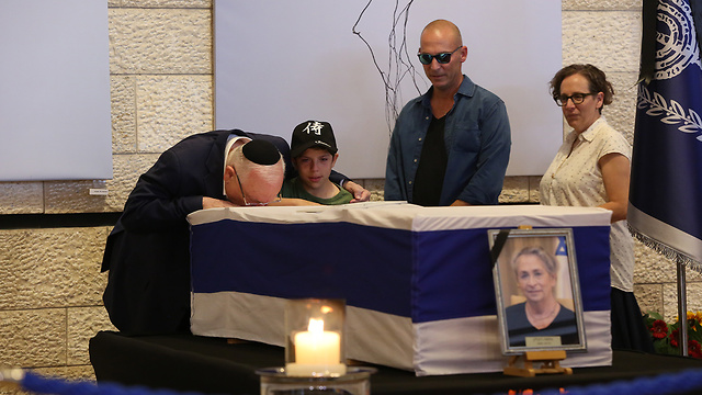 President Reuven Rivlin mourns his wife as her coffin lies in state in Jerusalem Theater (Photo: Amit Shabi)