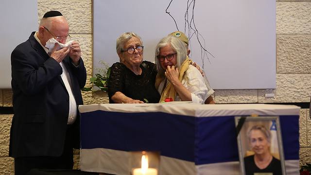 President Reuven Rivlin mourns his wife as her coffin lies in state in Jerusalem Theater (Photo: Amit Shabi)
