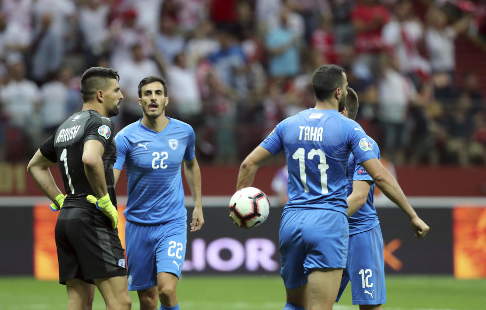שחקני נבחרת ישראל מאוכזבים (צילום: AP)
