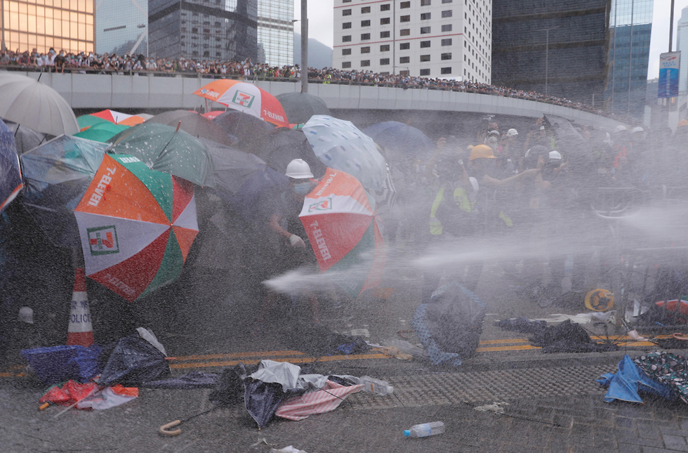 הפגנות הפגנה מחאה הונג קונג נגד חוק ההסגרה הסגרה ל סין (צילום: רויטרס)