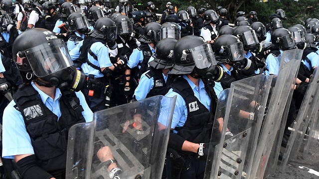 הפגנות הפגנה עימותים מחאה הונג קונג נגד חוק ההסגרה הסגרה ל סין (צילום: AFP)