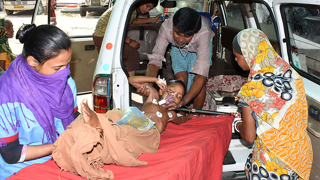 Заболевший малыш. Фото: AFP