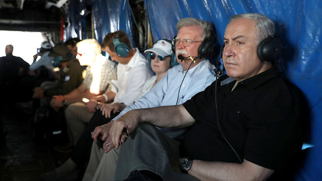 Benjamin Netanyahu and John Bolton on an aerial tour of the Jordan Valley  (Photo: Reuters)