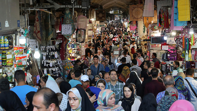 Iranians go shopping in old grand bazaar in Tehran, June 24, 2019 (Photo: AP) (Photo: AP)