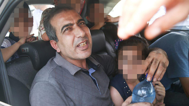 Mahmoud Katusa with his daughter upon his release from military prison (Photo: Ohad Zwigenberg) (Photo: Ohad Zwigenberg)