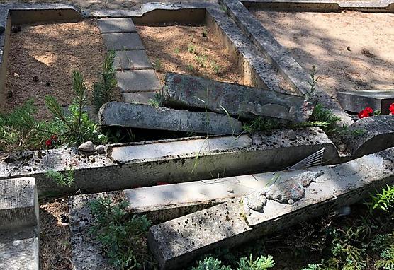 Vandalized grave-stones at the Jewish cemetery in Tallinn, Estonia