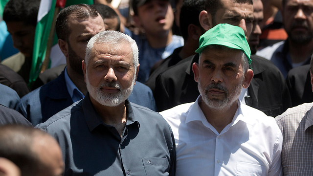Hamas leaders Ismail Haniyeh (left) and Yahya Sinwar in Gaza, June 2019 (Photo: AFP)