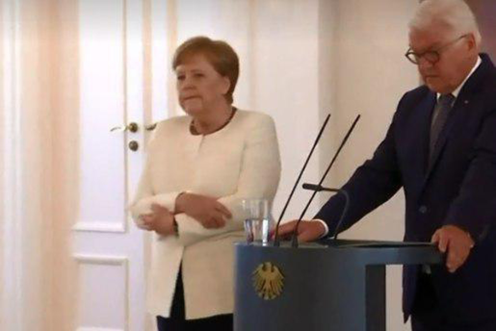 אנגלה מרקל רועדת בפגישה עם נשיא גרמניה (צילום: רויטרס)