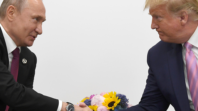 Путин и Трамп на встрече в Осаке. Фото: AP