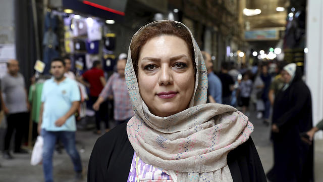 Nahroba Alirezei, a 35-year-old English-language teacher (Photo: AP)