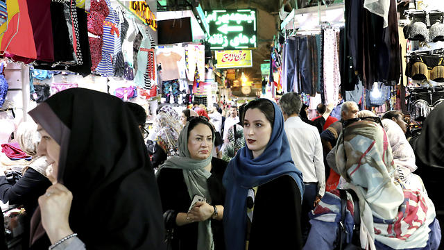 Women in Tehran's Grand Bazaar (Photo: AP)