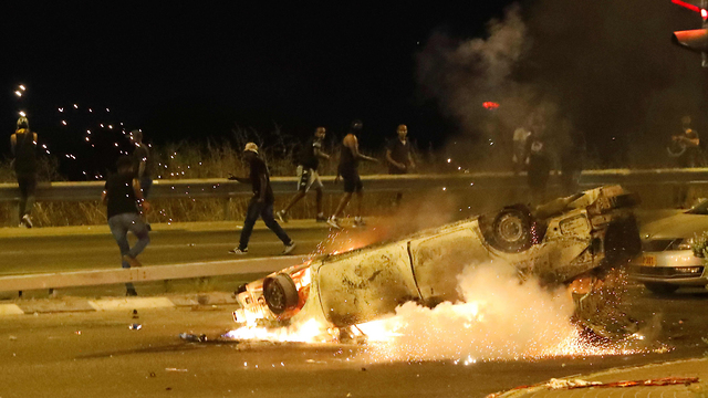  Беспорядки в Нетании. Фото: AFP (צילום: AFP)