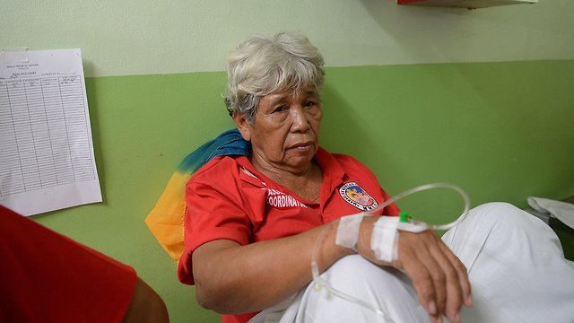 פיליפינים הפיליפינים יום הולדת 90 אימלדה מלקוס הרעלת מזון למאות (צילום: AFP)