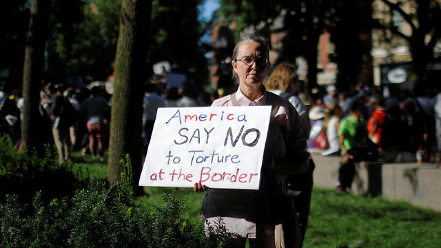Demonstrators take part in the Never Again Para Nadir protest, led by Jewish groups, against ICE Detention camps in Boston, July 2, 2019.