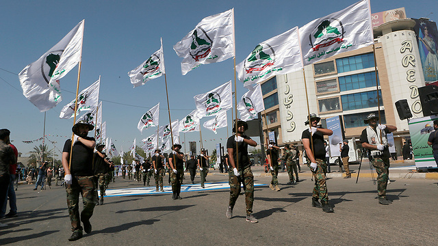 בגדד עיראק אל-חשד א-שעבי PMF מיליציות שיעיות הגיוס העממי (צילום: AP)
