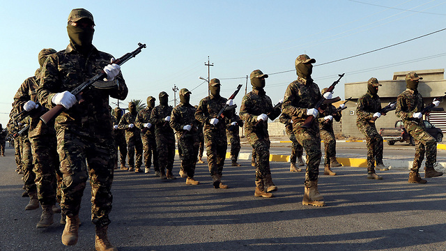 עיירה טזה ליד כירכוכ עיראק אל-חשד א-שעבי PMF מיליציות שיעיות הגיוס העממי (צילום: רויטרס)