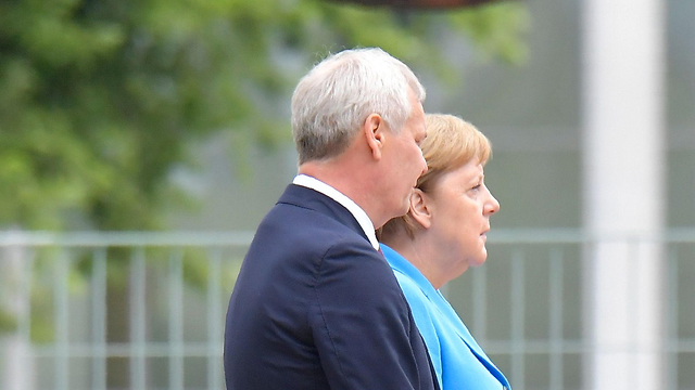 Меркель на встрече в Берлине, 10 июля. Фото: AFP