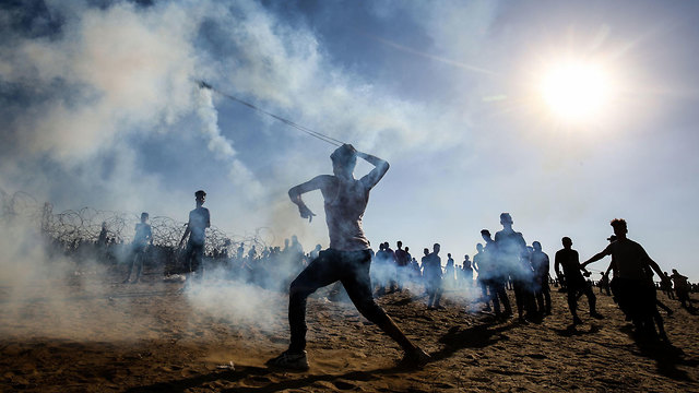 הפגנות הפגנה התפרעויות מהומות גבול רצועת עזה (צילום: AFP)