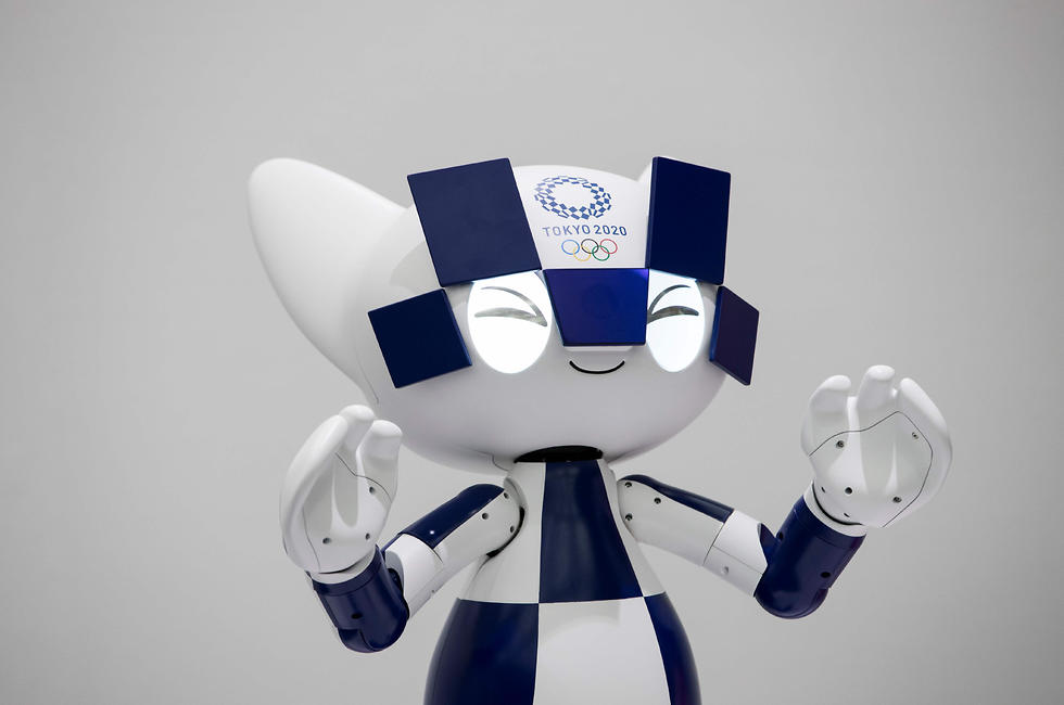 רובוט שיוצר במיוחד כדי לסייע באולימפיאדת טוקיו (צילום: AFP)