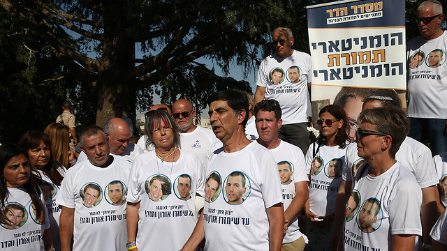 Hadar Goldin and Oron Shaul families at Tuesday's ceremony (Photo: Ohad Zwigenberg)