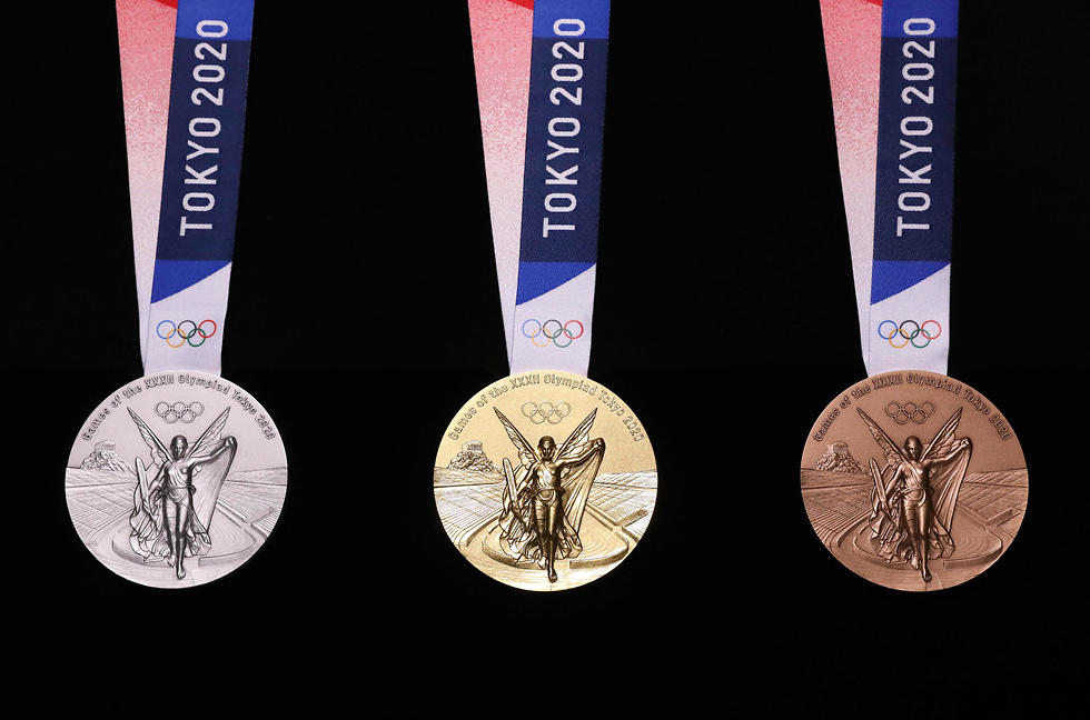 המדליות באולימפיאדת טוקיו (צילום: AFP)