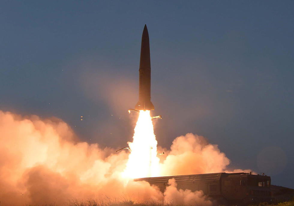 שיגור הטיל בצפון קוריאה (צילום: AFP)