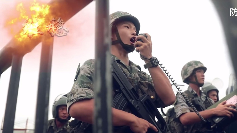 סרטון תעמולה של צבא סין איום על הונג קונג  (צילום: AFP)