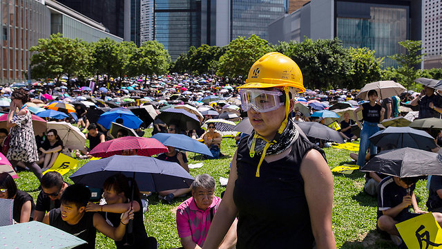 מחאה הפגנות שביתה הונג קונג סין (צילום: EPA)