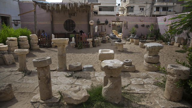 In this July 17, 2019 photo, ancient columns are displayed at the Al-Qarara private museum in Khan Younis, Southern Gaza Strip