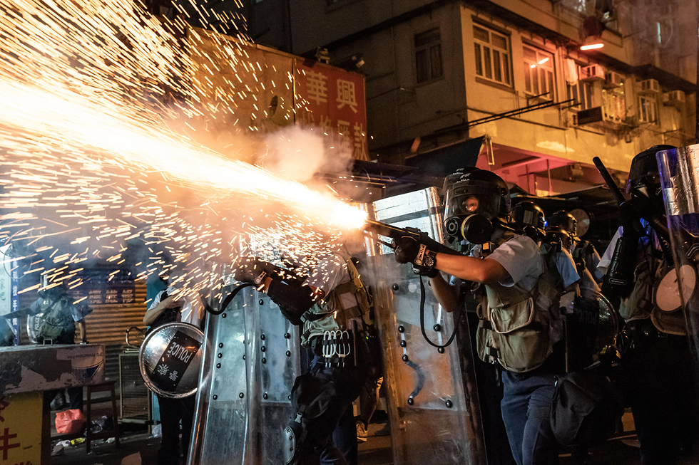 הפגנה מהומות הונג קונג סין  (צילום: gettyimages)