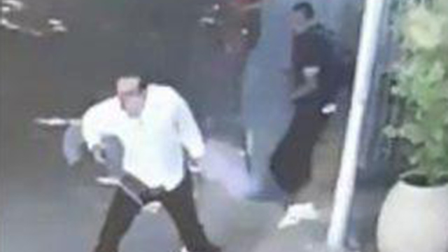Footage of the incident showing the Palestinian, right, and his victim, left 
