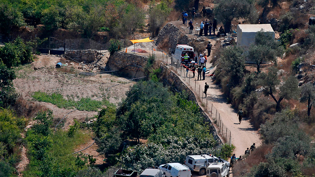 זירת הפיגוע במעיין דני (צילום: AFP)