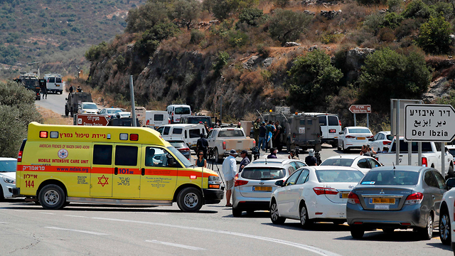 Aftermath of the attack that killed Rina Shnerb near Dolev in the West Bank (Photo: AFP)