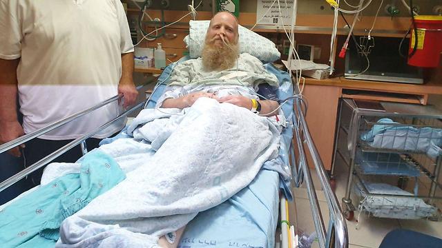 Rabbi Eitan Shnerb was wounded in the terror attack that killed his daughter (Photo: Shmulik Davidpur)