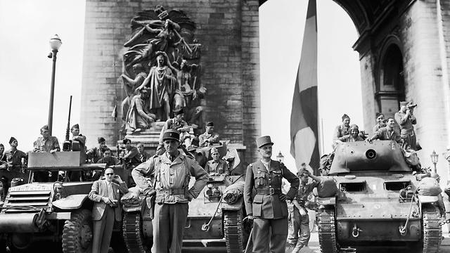 French general Philippe Leclerc and Colonel Louis Dio (in the foreground) wait to march on the Champs Elysees Avenue with the troops of the French 2nd Armored Division (2e Division Blindée, 2ème DB), to celebrate the Liberation of Paris