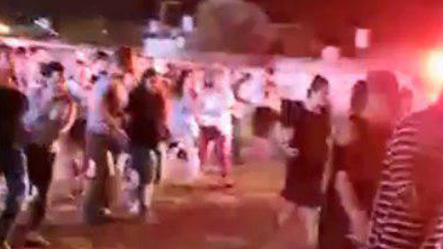 Sderot residents running for cover as Gaza terrorists fire rockets during a music festival in the city